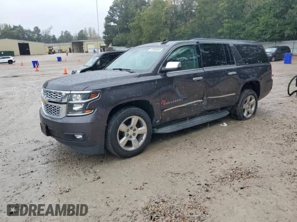 2015 Chevrolet Suburban LT z VIN 1GNSCJKC9FR548894, wystawiony jako Copart lot #81880935 z przebiegiem 161 389 mil mil oraz Szkoda całkowita • Salvage title. Historia ofert i sprzedaży dostępna na DreamBid. Obrazek 1.
