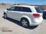 2009 Dodge Journey SXT z VIN 3D4GH57VX9T594749, wystawiony jako IAAI lot #42938171 z przebiegiem 216 081 mil mil oraz . Historia ofert i sprzedaży dostępna na DreamBid. Obrazek 3.