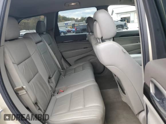 2012 Jeep Grand Cherokee Laredo z VIN 1C4RJFAG0CC156397, wystawiony jako Copart lot #87400775 z przebiegiem 165 192 mil mil oraz Szkoda całkowita • Salvage title. Historia ofert i sprzedaży dostępna na DreamBid. Obrazek 11.