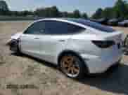 2023 Tesla Model Y Long Range with VIN 7SAYGAEEXPF895200, listed as a Copart auction lot 80203825 with Not provided miles and Salvage title. Bid and sale history available at DreamBid. Image 2.