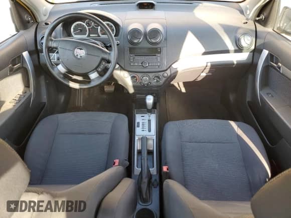 2009 Chevrolet Aveo 1LT с VIN KL1TD56E89B643772, выставлен на аукционе Copart как лот 71850065 с пробегом 56 427 миль миль и Списание • Salvage title. История ставок и продаж доступна на DreamBid. Изображение 8.