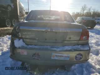 2003 Saturn LS with VIN 1G8JU54F03Y546737, listed as a Copart auction lot 87403084 with 102,957 mi miles and Salvage title. Bid and sale history available at DreamBid. Image 6.