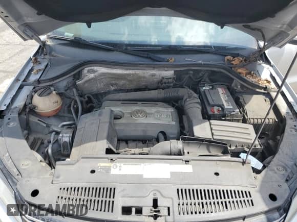 2013 Volkswagen Tiguan SE z VIN WVGAV3AX3DW612758, wystawiony jako Copart lot #53255775 z przebiegiem 121 681 mil mil oraz Czysty tytuł • Clean title. Historia ofert i sprzedaży dostępna na DreamBid. Obrazek 12.