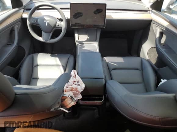 2023 Tesla Model Y Long Range с VIN 7SAYGDEE1PA166467, выставлен на аукционе Copart как лот 60252694 с пробегом 20 216 миль миль и Списание • Salvage title. История ставок и продаж доступна на DreamBid. Изображение 8.