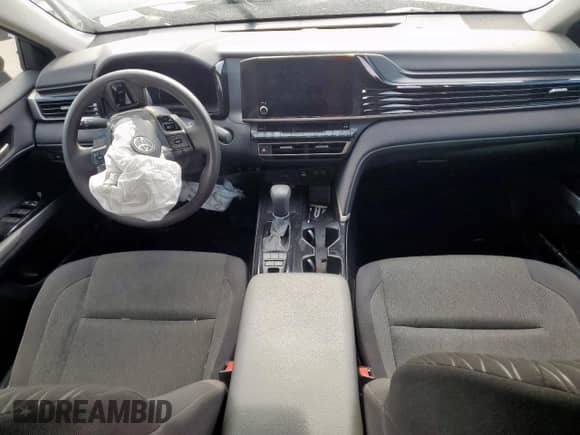 2025 Toyota Camry LE с VIN 4T1DAACK8SU526658, выставлен на аукционе Copart как лот 71537155 с пробегом Не указан миль и Списание • Salvage title. История ставок и продаж доступна на DreamBid. Изображение 8.