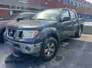 2010 Nissan Frontier LE with VIN 1N6AD0EV5AC410285, listed as a Copart auction lot 84605955 with 199,787 mi miles and Clean title. Bid and sale history available at DreamBid. Image 2.