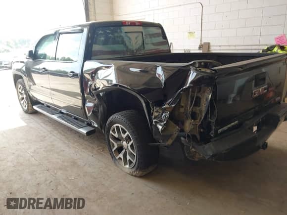 2017 GMC Sierra 1500 SLT with VIN 3GTU2NEC9HG158663, listed as a IAAI auction lot 42691474 with 159,405 mi miles and . Bid and sale history available at DreamBid. Image 3.
