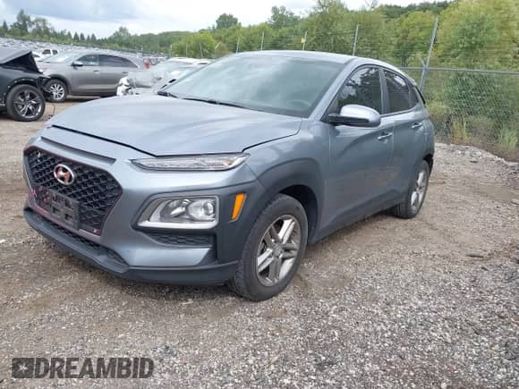 2019 Hyundai Kona SE z VIN KM8K12AA1KU242442, wystawiony jako IAAI lot #43098465 z przebiegiem 82 658 mil mil oraz . Historia ofert i sprzedaży dostępna na DreamBid. Obrazek 2.