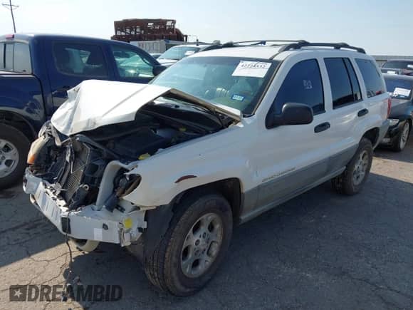 2000 Jeep Grand Cherokee Laredo z VIN 1J4GW48N5YC236166, wystawiony jako IAAI lot #42724532 z przebiegiem 172 052 mil mil oraz . Historia ofert i sprzedaży dostępna na DreamBid. Obrazek 2.