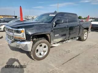 2018 Chevrolet Silverado 1500 LT с VIN 3GCUCRER0JG221373, выставлен на аукционе Copart как лот 70875145 с пробегом 92 235 миль миль и Списание • Salvage title. История ставок и продаж доступна на DreamBid. Изображение 1.