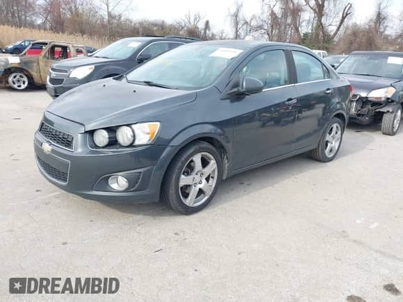 2014 Chevrolet Sonic LTZ with VIN 1G1JE5SB1E4200234, listed as a IAAI auction lot 41850396 with 173,324 mi miles and . Bid and sale history available at DreamBid. Image 2.