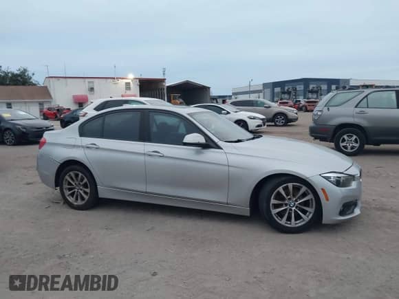 2018 BMW 3 Series 320i with VIN WBA8A9C51JAH12024, listed as a IAAI auction lot 43198146 with 98,143 mi miles and . Bid and sale history available at DreamBid. Image 13.