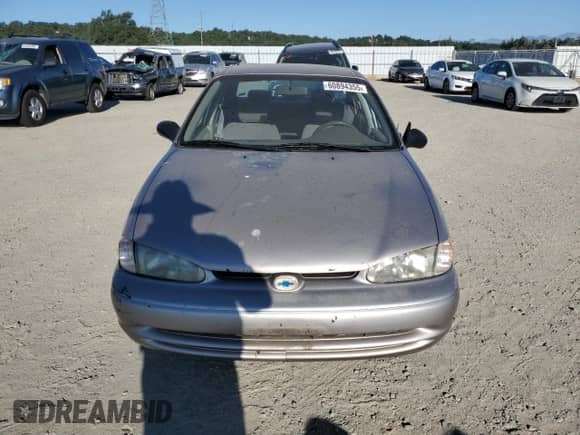 2000 Chevrolet Prizm with VIN 1Y1SK5485YZ407556, listed as a Copart auction lot 60894355 with 123,708 mi miles and Salvage title. Bid and sale history available at DreamBid. Image 5.