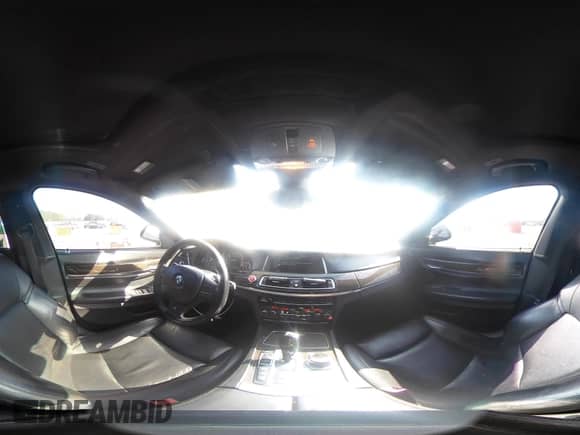 2013 BMW 7 Series 750Li xDrive with VIN WBAYF8C54DD141690, listed as a IAAI auction lot 42804428 with 120,000 mi miles and . Bid and sale history available at DreamBid. Image 19.