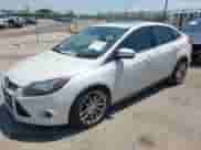 2012 Ford Focus Titanium with VIN 1FAHP3J24CL428808, listed as a IAAI auction lot 42966757 with 118,347 mi miles and . Bid and sale history available at DreamBid. Image 2.