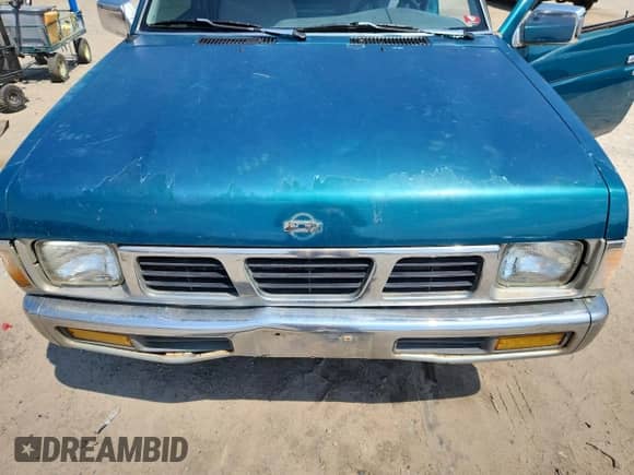 1995 Nissan Frontier with VIN 1N6SD11S3SC358078, listed as a Copart auction lot 71859815 with 118,833 mi miles and Salvage title. Bid and sale history available at DreamBid. Image 11.