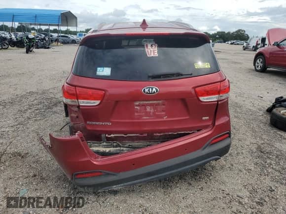 2017 Kia Sorento LX with VIN 5XYPG4A37HG218663, listed as a Copart auction lot 68023125 with 94,799 mi miles and Salvage title. Bid and sale history available at DreamBid. Image 6.