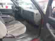 2005 GMC Sierra 1500 SLE с VIN 2GTEC19V451236860, выставлен на аукционе IAAI как лот 43046560 с пробегом 218 285 миль миль и . История ставок и продаж доступна на DreamBid. Изображение 5.