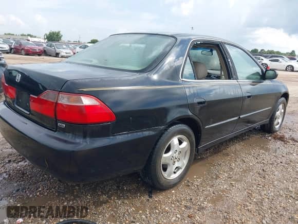 1998 Honda Accord EX with VIN 1HGCG1654WA053029, listed as a IAAI auction lot 42783728 with 254,349 mi miles and . Bid and sale history available at DreamBid. Image 4.