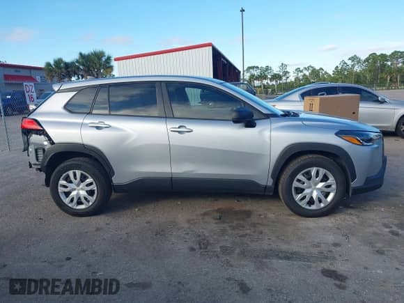 2022 Toyota Corolla Cross L with VIN 7MUAAAAG6NV010688, listed as a IAAI auction lot 41212520 with 50,075 mi miles and . Bid and sale history available at DreamBid. Image 14.