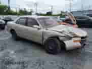 1994 Toyota Camry LE z VIN 4T1SK12E5RU358097, wystawiony jako Copart lot #70173615 z przebiegiem 369 918 mil mil oraz Szkoda całkowita • Salvage title. Historia ofert i sprzedaży dostępna na DreamBid. Obrazek 4.