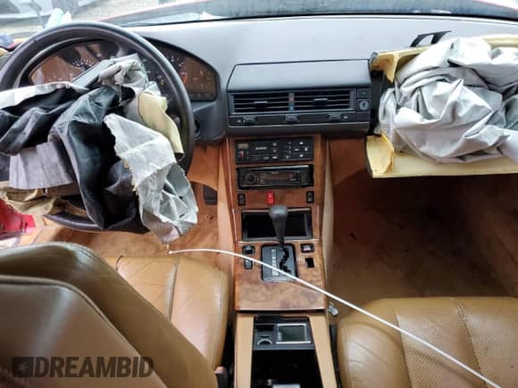 1991 Mercedes-Benz SL с VIN WDBFA66E4MF014563, выставлен на аукционе Copart как лот 82143064 с пробегом 115 194 миль миль и Списание • Salvage title. История ставок и продаж доступна на DreamBid. Изображение 8.