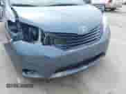 2015 Toyota Sienna LE AAS with VIN 5TDKK3DC3FS638001, listed as a IAAI auction lot 42595168 with 143,301 mi miles and . Bid and sale history available at DreamBid. Image 6.