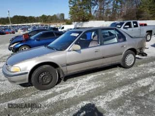 1991 Honda Accord LX with VIN JHMCB765XMC099044, listed as a Copart auction lot 42520935 with 165,870 mi miles and Salvage title. Bid and sale history available at DreamBid. Image 1.