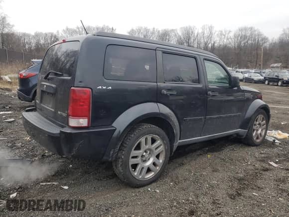 2009 Dodge Nitro SXT с VIN 1D8GU28K69W522373, выставлен на аукционе Copart как лот 86583224 с пробегом 254 849 миль миль и Списание • Salvage title. История ставок и продаж доступна на DreamBid. Изображение 3.