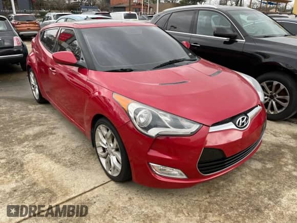 2015 Hyundai Veloster z VIN KMHTC6AD0FU238274, wystawiony jako Copart lot #45174464 z przebiegiem 143 112 mil mil oraz . Historia ofert i sprzedaży dostępna na DreamBid. Obrazek 1.