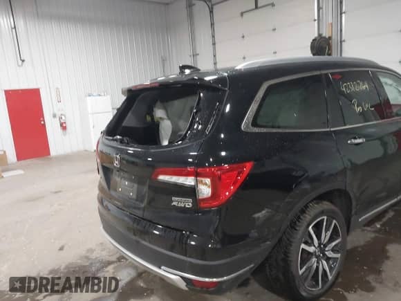 2021 Honda Pilot Touring 7-Passenger с VIN 5FNYF6H63MB082603, выставлен на аукционе IAAI как лот 42312764 с пробегом 60 000 миль миль и . История ставок и продаж доступна на DreamBid. Изображение 6.
