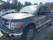 2013 Ford F-150 Lariat with VIN 1FTFW1ET5DFC93463, listed as a IAAI auction lot 43182949 with 133,397 mi miles and . Bid and sale history available at DreamBid. Image 2.