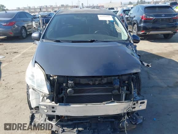 2013 Toyota Prius One z VIN JTDKN3DU5D1706258, wystawiony jako IAAI lot #42941896 z przebiegiem 94 396 mil mil oraz . Historia ofert i sprzedaży dostępna na DreamBid. Obrazek 13.