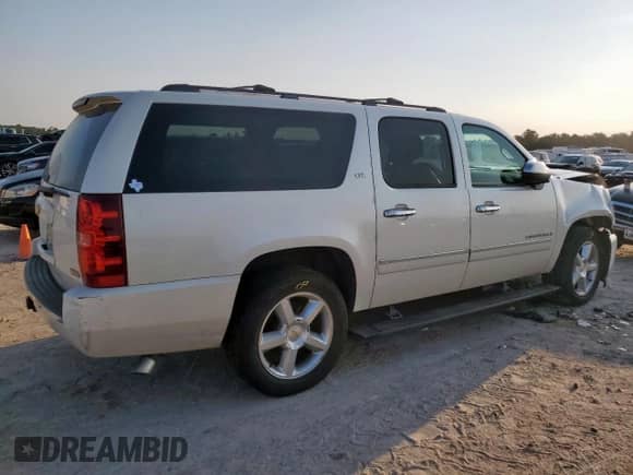 2011 Chevrolet Suburban LTZ with VIN 1GNSCKE01BR130492, listed as a Copart auction lot 68272725 with 199,542 mi miles and Salvage title. Bid and sale history available at DreamBid. Image 3.