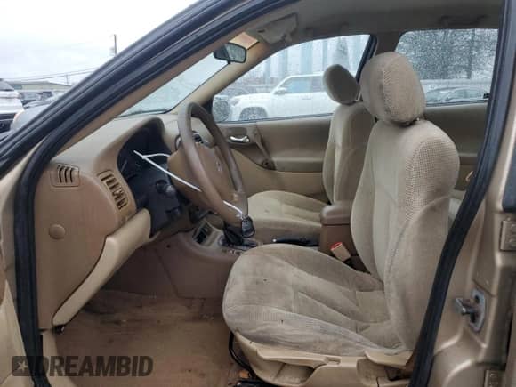 2001 Saturn LS with VIN 1G8JU52FX1Y566803, listed as a Copart auction lot 84338304 with 144,674 mi miles and Salvage title. Bid and sale history available at DreamBid. Image 7.