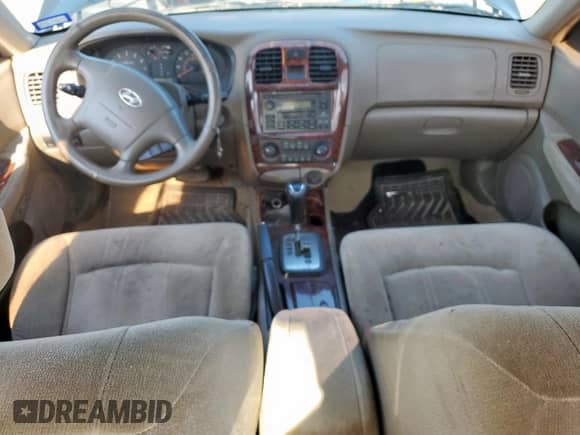 2005 Hyundai Sonata GLS with VIN KMHWF35HX5A136674, listed as a Copart auction lot 71004655 with 261,038 mi miles and Salvage title. Bid and sale history available at DreamBid. Image 8.
