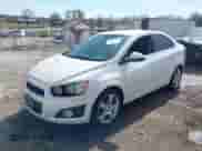 2014 Chevrolet Sonic LTZ with VIN 1G1JE5SB6E4132271, listed as a IAAI auction lot 41867508 with 115,116 mi miles and . Bid and sale history available at DreamBid. Image 2.