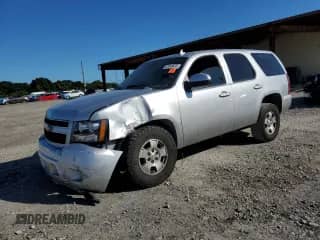 2013 Chevrolet Tahoe LT с VIN 1GNSCBE03DR349795, выставлен на аукционе Copart как лот 87048635 с пробегом 212 002 миль миль и Списание • Salvage title. История ставок и продаж доступна на DreamBid. Изображение 1.