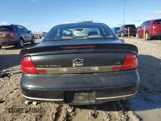 1996 Chevrolet Monte Carlo LS z VIN 2G1WW12MXT9160579, wystawiony jako Copart lot #78601644 z przebiegiem 128 550 mil mil oraz Nie do naprawy • Non repairable. Historia ofert i sprzedaży dostępna na DreamBid. Obrazek 6.