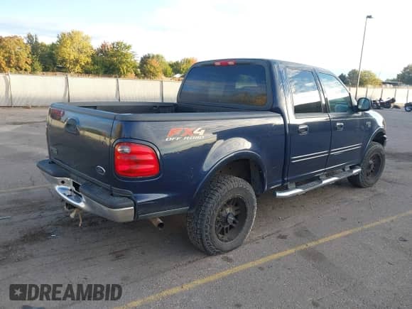 2003 Ford F-150 XLT z VIN 1FTRW08L73KD26519, wystawiony jako IAAI lot #43430541 z przebiegiem Nie podano mil oraz . Historia ofert i sprzedaży dostępna na DreamBid. Obrazek 4.