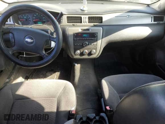 2012 Chevrolet Impala Police Police с VIN 2G1WD5E32C1309839, выставлен на аукционе Copart как лот 44011485 с пробегом 142 353 миль миль и Списание • Salvage title. История ставок и продаж доступна на DreamBid. Изображение 8.