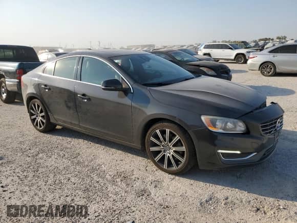 2015 Volvo S60 T6 Drive-E with VIN YV149MFK7F1343313, listed as a Copart auction lot 76279894 with 60,091 mi miles and Salvage title. Bid and sale history available at DreamBid. Image 4.