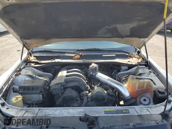 2005 Dodge Magnum SE with VIN 2D4FV48T05H679761, listed as a Copart auction lot 63411815 with 192,106 mi miles and Salvage title. Bid and sale history available at DreamBid. Image 11.