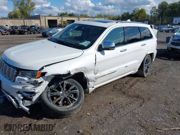 2018 Jeep Grand Cherokee Overland with VIN 1C4RJFCG3JC207160, listed as a IAAI auction lot 43300480 with 87,075 mi miles and . Bid and sale history available at DreamBid. Image 2.