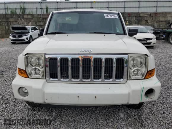 2007 Jeep Commander Sport z VIN 1J8HG48K57C662511, wystawiony jako Copart lot #66227155 z przebiegiem 170 649 mil mil oraz Szkoda całkowita • Salvage title. Historia ofert i sprzedaży dostępna na DreamBid. Obrazek 5.