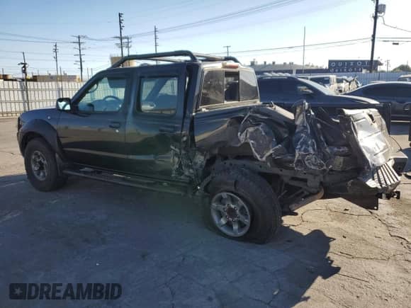 2003 Nissan Frontier SE with VIN 1N6ED27T23C436760, listed as a Copart auction lot 81446815 with 202,442 mi miles and Salvage title. Bid and sale history available at DreamBid. Image 2.