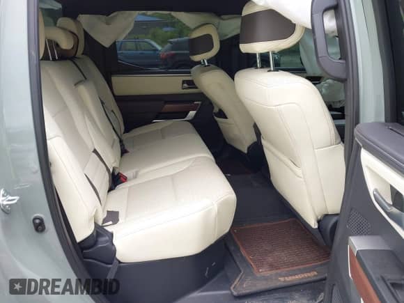 2024 Toyota Tundra 1794 Edition with VIN 5TFMA5DB7RX237449, listed as a IAAI auction lot 42300855 with 16,295 mi miles and . Bid and sale history available at DreamBid. Image 8.