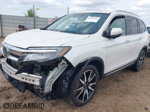 2019 Honda Pilot Touring 8-Passenger z VIN 5FNYF5H94KB005563, wystawiony jako IAAI lot #42059065 z przebiegiem 117 794 mil mil oraz . Historia ofert i sprzedaży dostępna na DreamBid. Obrazek 2.