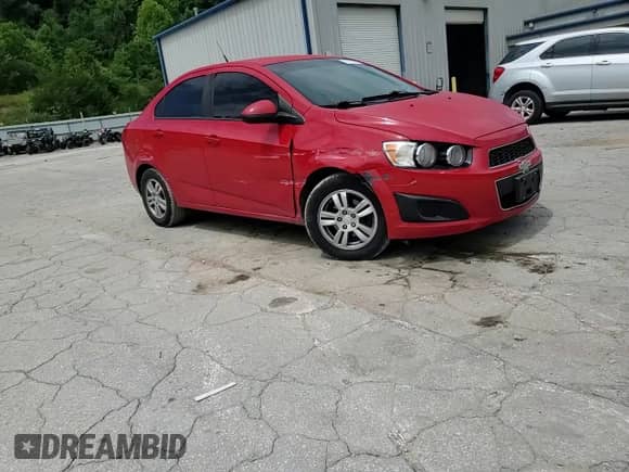 2012 Chevrolet Sonic LS z VIN 1G1JA5SH1C4221176, wystawiony jako Copart lot #67767445 z przebiegiem 204 833 mil mil oraz Szkoda całkowita • Salvage title. Historia ofert i sprzedaży dostępna na DreamBid. Obrazek 13.