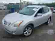 2009 Nissan Rogue SL with VIN JN8AS58T59W320889, listed as a IAAI auction lot 43313718 with 189,797 mi miles and . Bid and sale history available at DreamBid. Image 6.